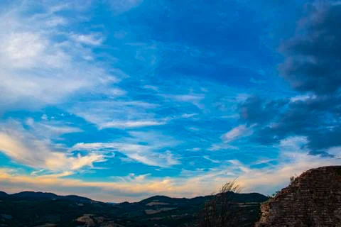 Blue sky and clouds at sunset Stock Photos