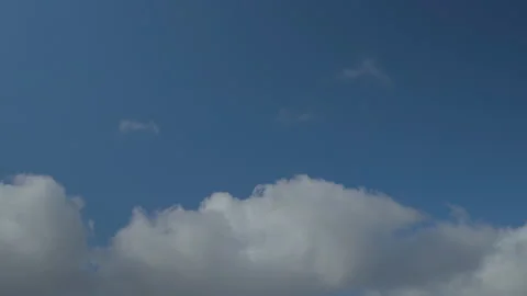 Blue sky and clouds. White clouds float across the sky Stock Footage 176243374