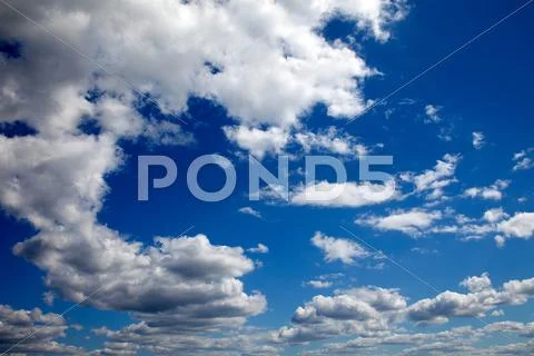 Blue sky and cumulus cloud Stock Photos