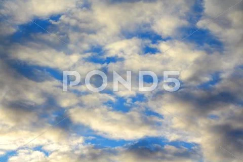 Blue sky and dark clouds Stock Photos