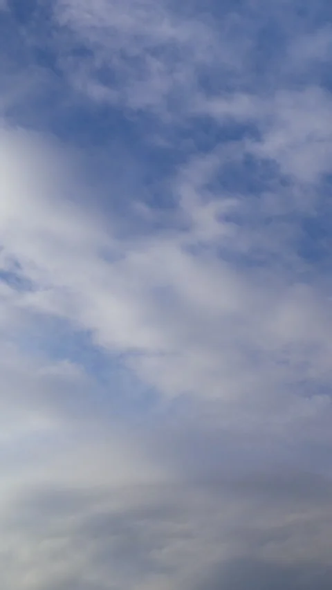 Blue Sky and Drifting White Clouds Time Lapse Vertical Video Stock-Footage 345937963