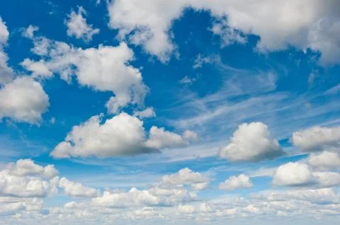 Blue sky and fluffy clouds light Stock Photos