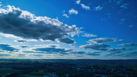 Blue sky and multiple clouds background Foto stock