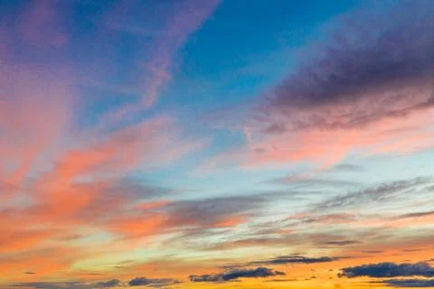 Blue sky and orange cloud in evening summer sunset Stock Photos