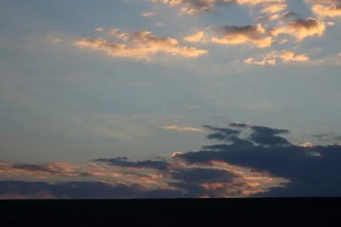 Blue sky and red clouds. Фото