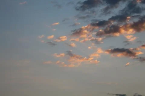 Blue sky and red clouds. Stock Photos