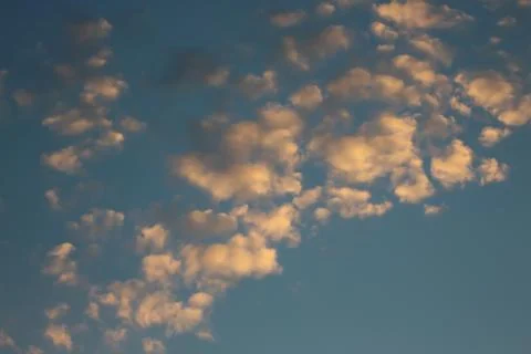 Blue sky and red clouds. Stock Photos