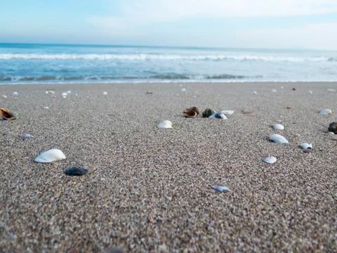 Blue sky and sea, Rakosi on the sand at sunset Stock Photos