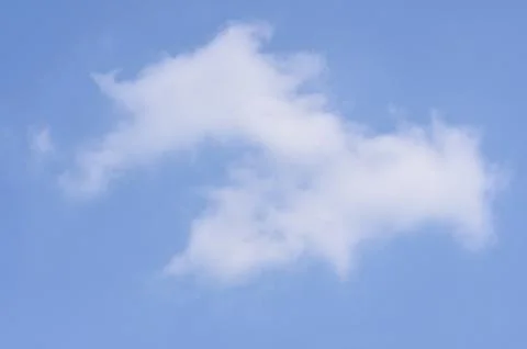 Blue sky and shape of cloud like an animal. Stock Photos