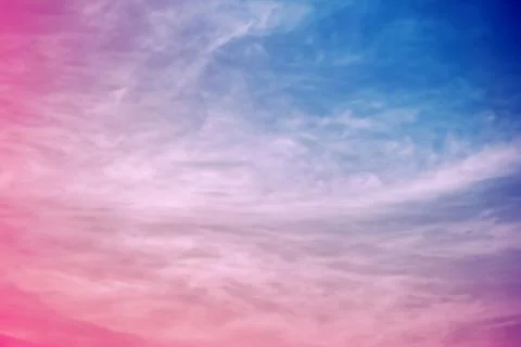 Blue sky and soft clouds processed with a color filter. abstract nature backg Stock Photos