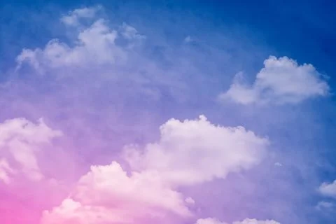 Blue sky and soft clouds processed with a color filter. abstract nature backg Stock Photos