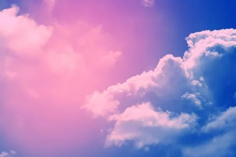 Blue sky and soft clouds processed with a color filter. abstract nature backg Stock Photos