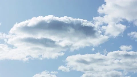 Blue sky and soft cumulus clouds timelapse Stock Footage 140208264