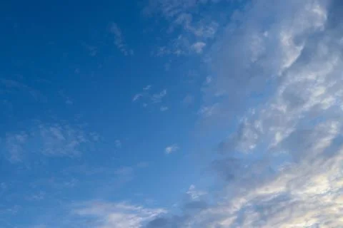 Blue sky and some clouds Stock Photos