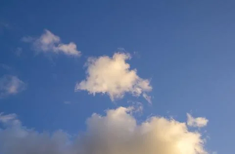 Blue Sky and Sunset Clouds Stock Photos