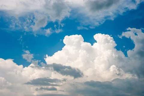 Blue sky and various cloud formations Stock Photos