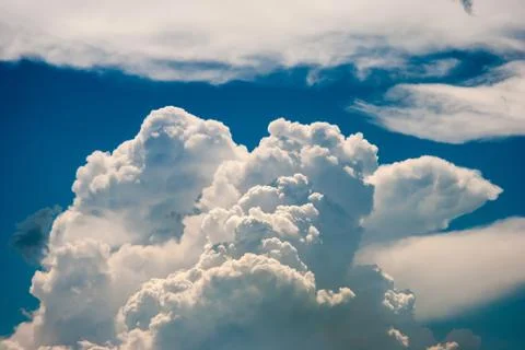 Blue sky and various cloud formations Stock Photos