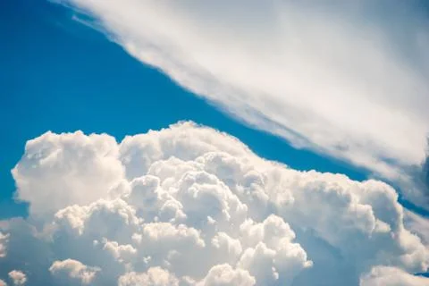 Blue sky and various cloud formations Stock Photos