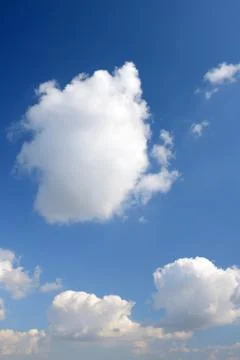 Blue sky and various cloud formations Stock Photos