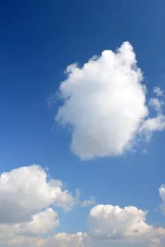 Blue sky and various cloud formations Stock Photos