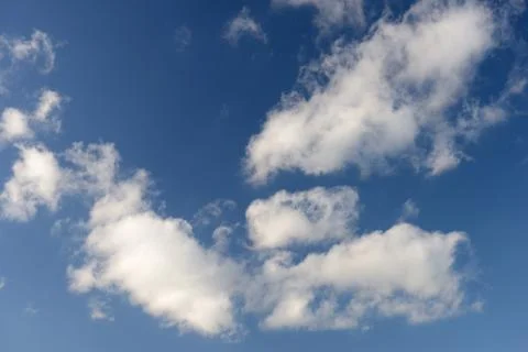 Blue sky and various cloud formations Stock Photos