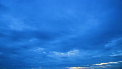 Blue sky and white cloud in a sunrise night to day 動画素材 111354489