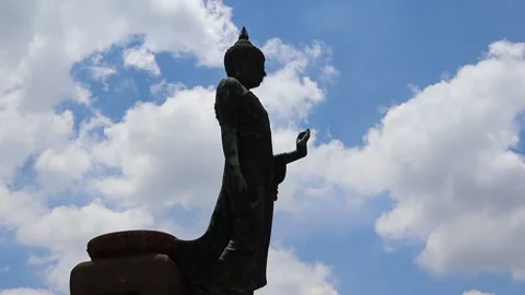 Blue sky and white cloud, right of Buddha statue Stock Footage 140108140