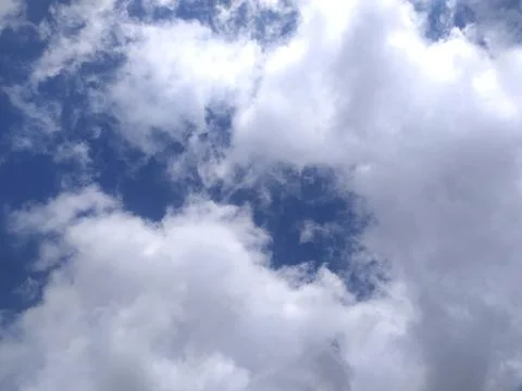 Blue sky and White cloud nature background. Stock Photos