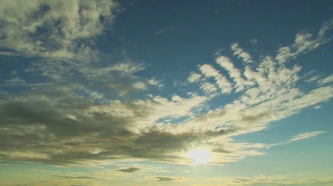Blue sky and white clouds above peaceful beach scene Stock Footage 32961552