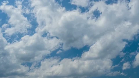 Blue sky and white clouds timelapse 4K Stock Footage 131537093