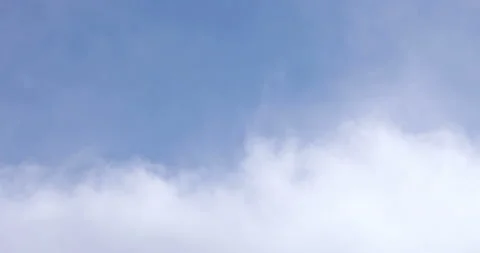 Blue Sky and White Clouds Drifting By Close Up 4K One Stock Footage 137563006