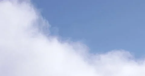 Blue Sky and White Clouds Drifting By Close Up 4K 3 Stock Footage 137565449