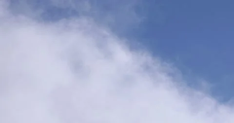 Blue Sky and White Clouds Drifting By Close Up 4K 5 Stock Footage 137570006