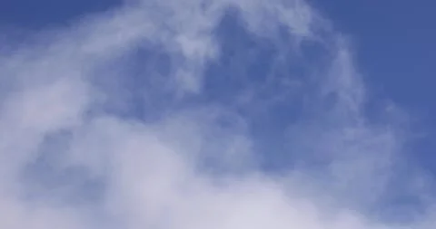 Blue Sky and White Clouds Drifting By Close Up 4K 7 Stock Footage 137576904