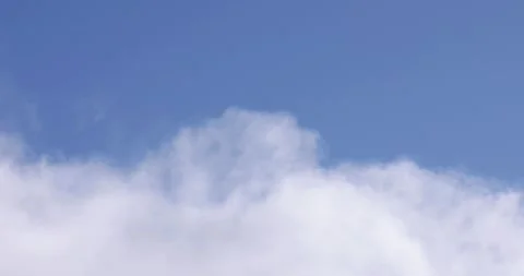 Blue Sky and White Clouds Drifting By Close Up 4K 8 Stock Footage 137578286