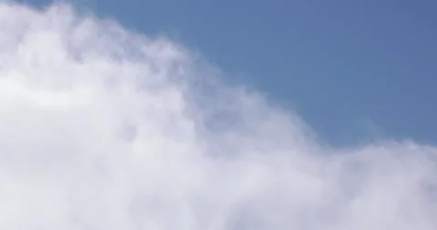 Blue Sky and White Clouds Drifting By Close Up 4K 12 Stock Footage 137589099