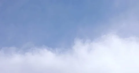 Blue Sky and White Clouds Drifting By Close Up 4K 1 Stock Footage 137601146