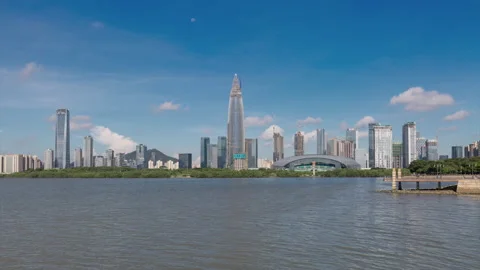 Blue sky and white clouds in modern cities Stock Footage 138728386