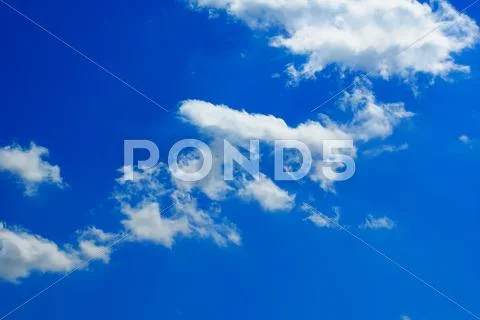 Blue sky and white clouds Stock Photos