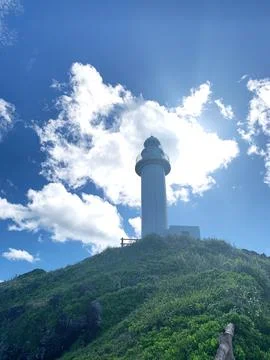 Blue sky and white clouds, lighthouse in Okinawa 01 Stock Photos