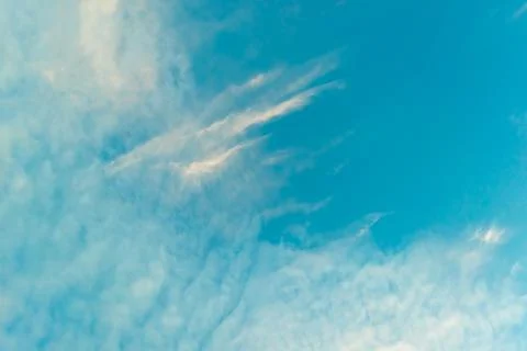 Blue sky and white clouds. Beautiful sky background. Heavenly landscape. Stock Photos