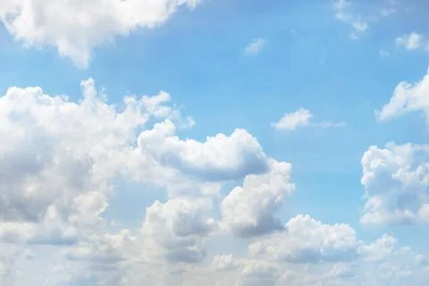 Blue sky and white clouds with sunlight,Blue sky and floating clouds Stock Photos