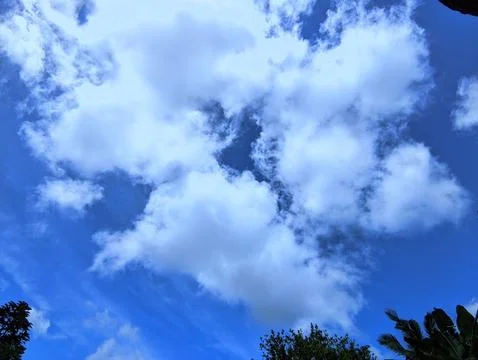 A blue sky and white clouds in the daytime Stock Photos