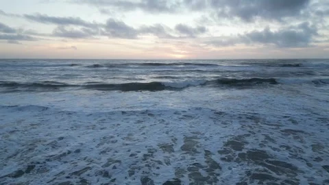 Blue sky and white waves Stock Footage 299137357