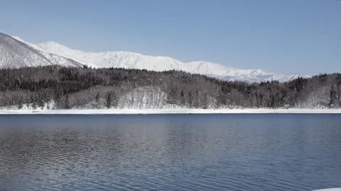 Blue Sky and winter scenery of lake is wonderful snow view in Nagano, Japan. Stock Footage 149043191
