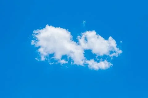 Blue sky background with big tiny clouds Stock Photos