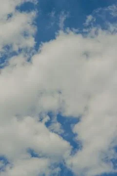 Blue sky background with clouds Beautiful blue sky with white clouds. Stock Photos