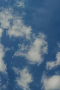 Blue sky background with clouds Beautiful blue sky with white clouds. Stock Photos