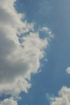 Blue sky background with clouds Beautiful blue sky with white clouds. Stock Photos