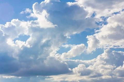 Blue sky background with clouds. Clouds on a clear day Foto stock